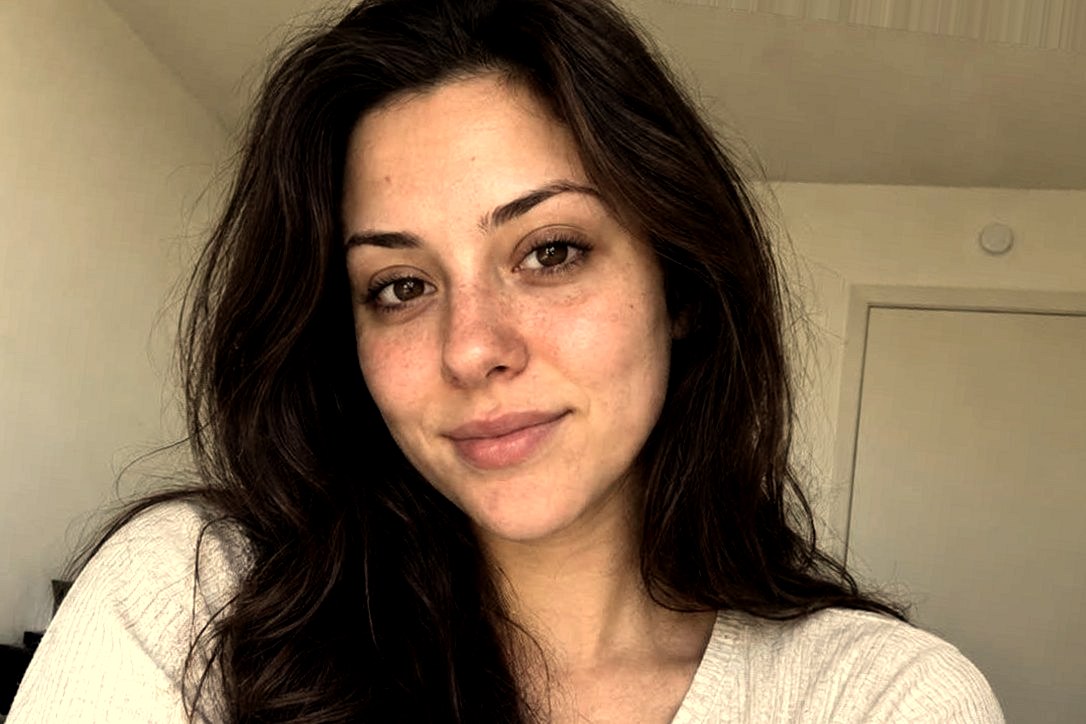 AI-generated photo of a fictional young woman with a harsh-light treatment